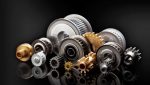 pulleys, gears, and components on black background